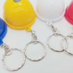 LED Lighted Bottle Opener Helmet Keychain - Image 4